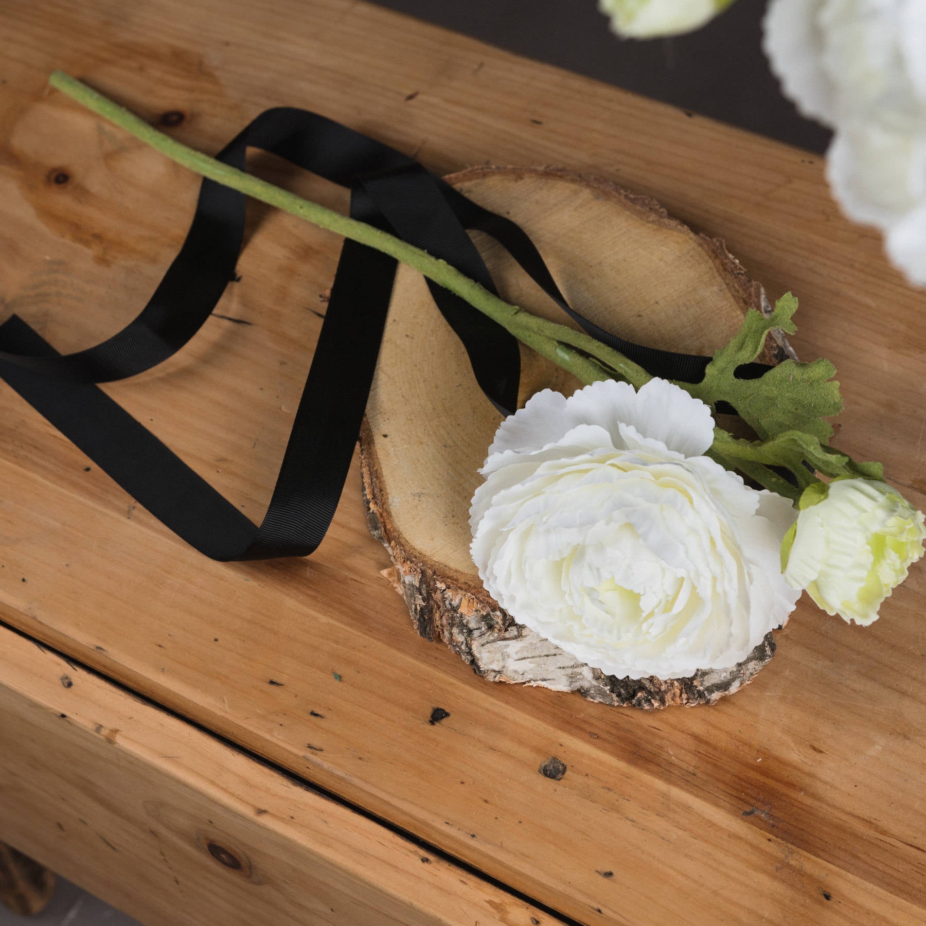 White Ranunculus Spray — side view white plastic