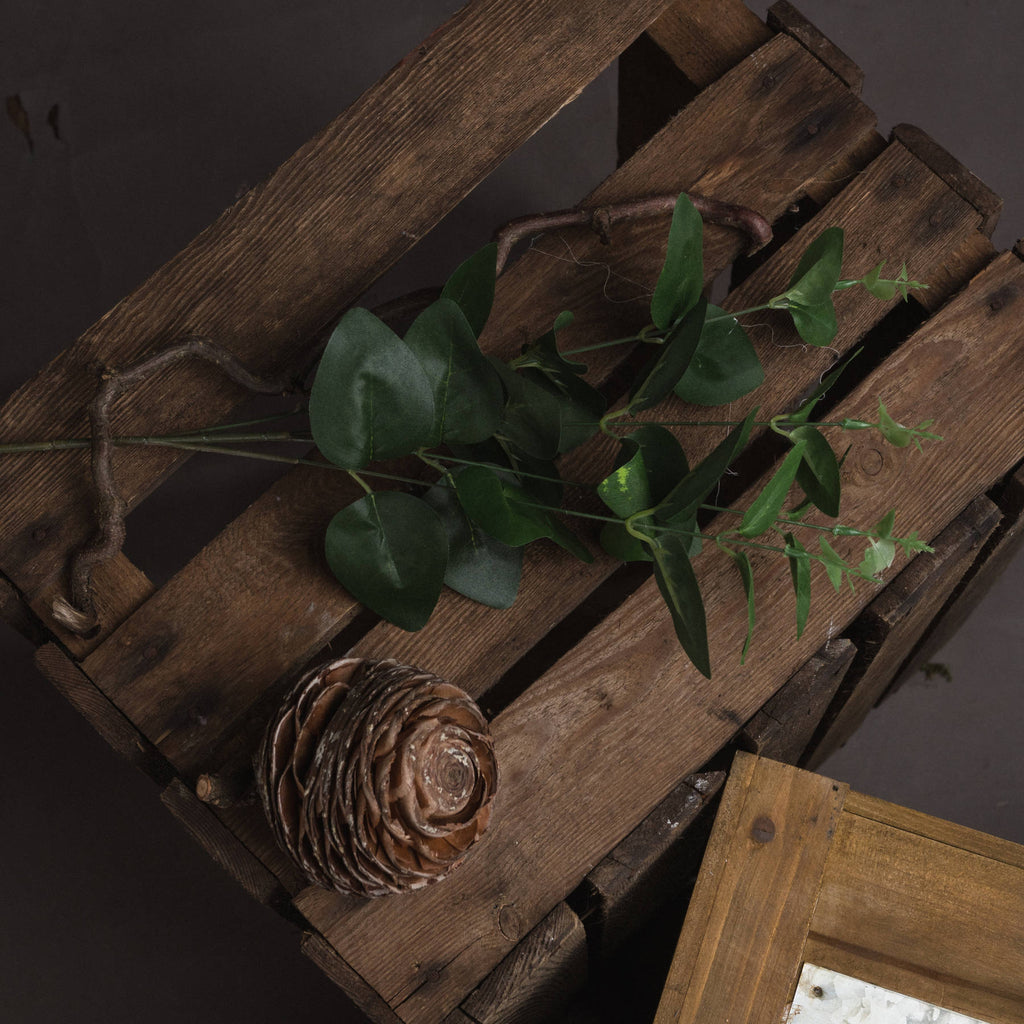Artificial Cineraria Eucalyptus spray in deep green: 1 included in The Remembrance Posy. Styling props not included.