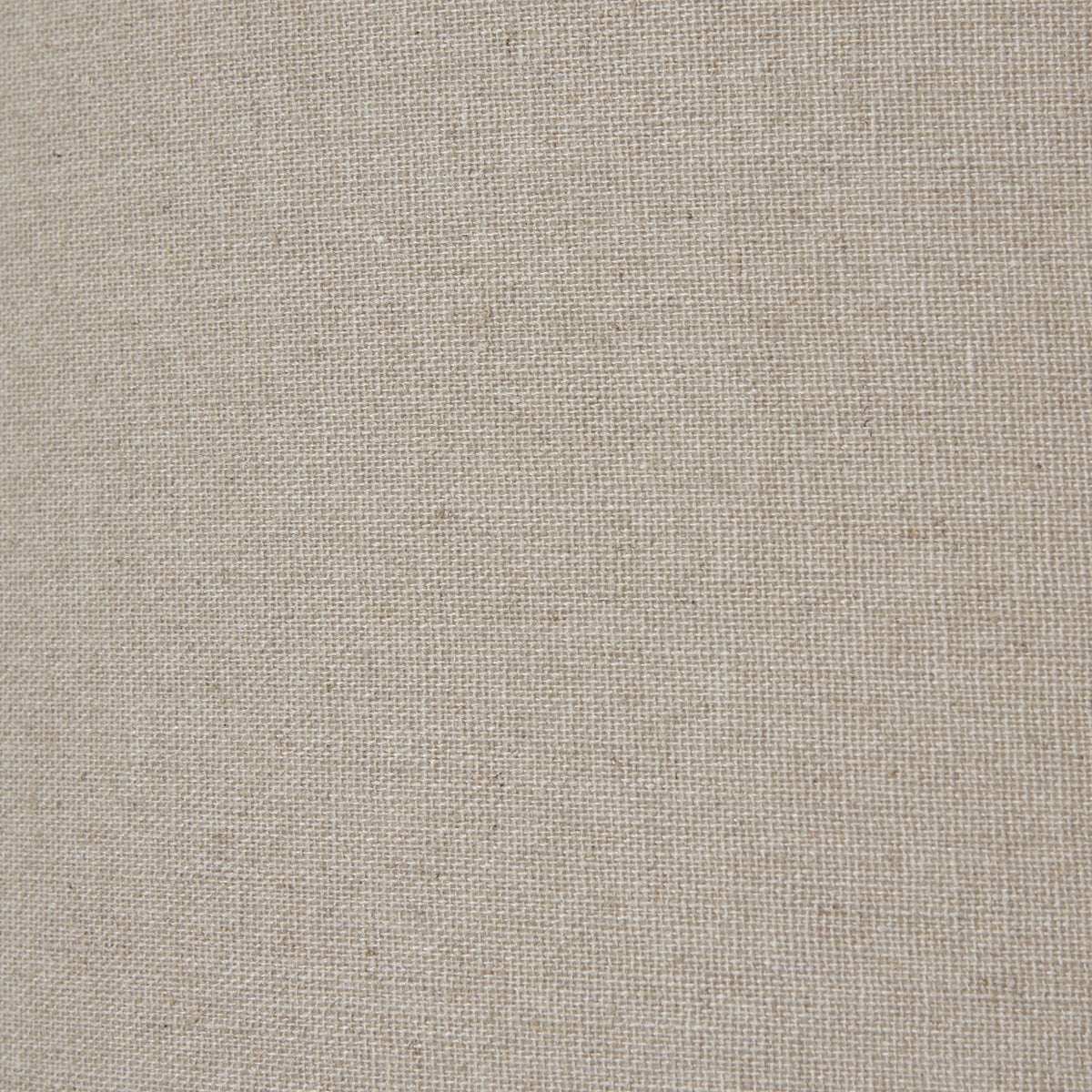 Squat White Beaded Ceramic Lamp With Linen Shade styled on a bedside