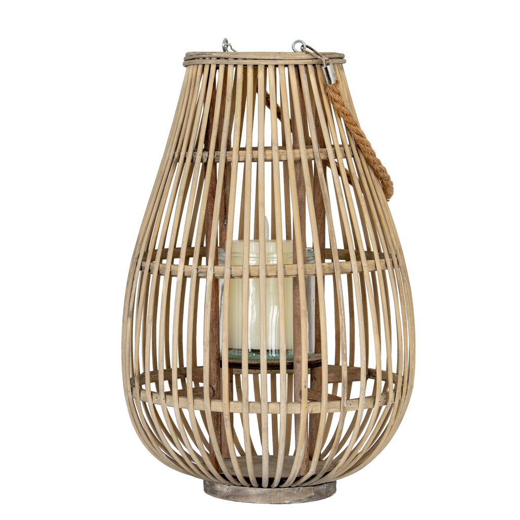 Medium Ellipse Lantern With Glass Holder — side view brown wicker