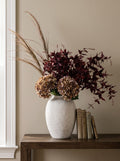 The Ashen Autumn Arrangement — coffee hydrangeas, brome grass and burgundy leaf in the Ashen tall vase
