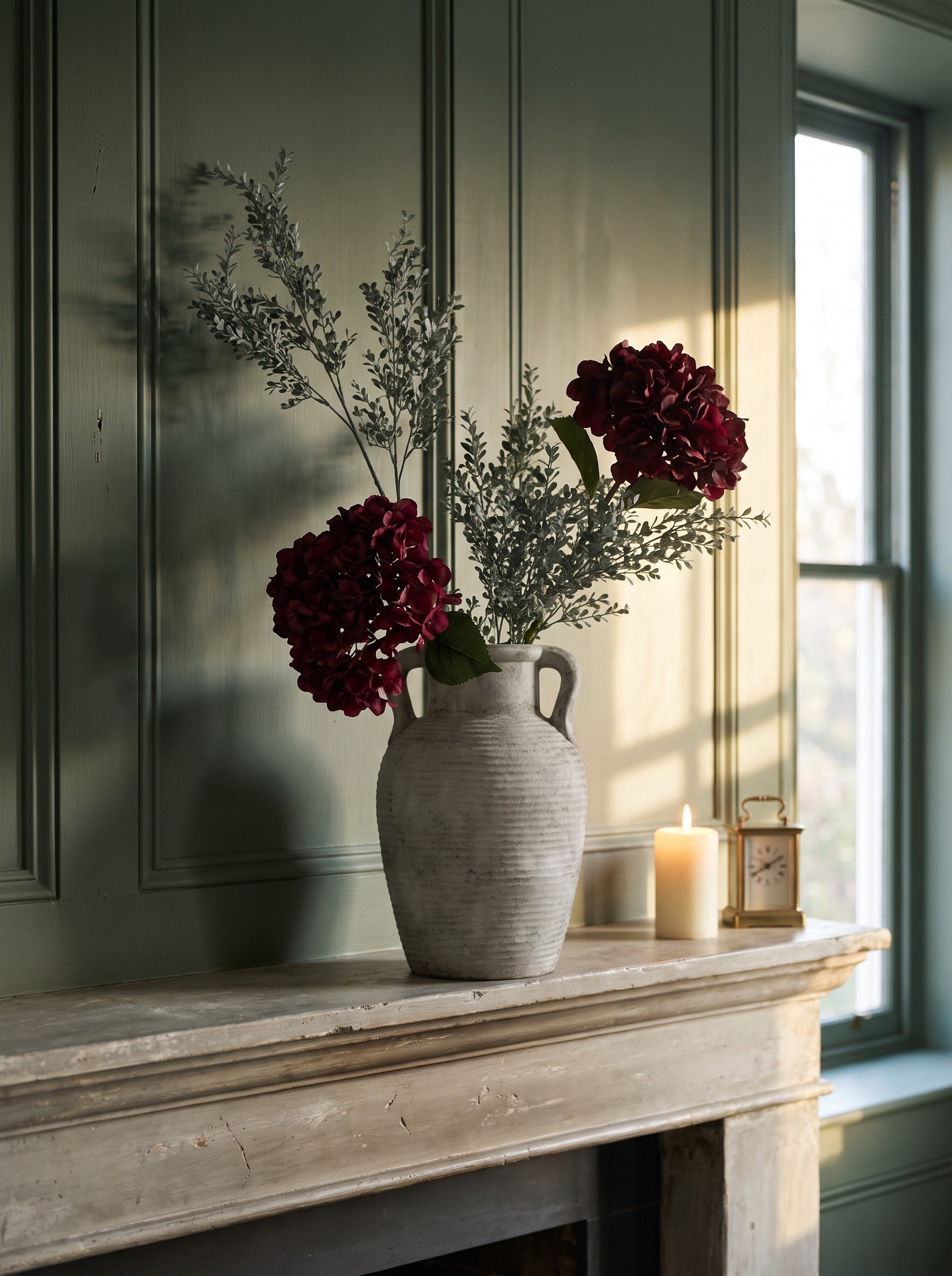The Athena Ruby Arrangement — ruby hydrangeas and grass sprays in the Athena stone amphora