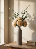The Gisela White Arrangement — white hydrangeas and eucalyptus in the crackle-glazed Gisela vase