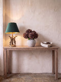 The Corner Edit — hares lamp, hydrangea vase and Coeur heart dish evenly spaced on a full console table