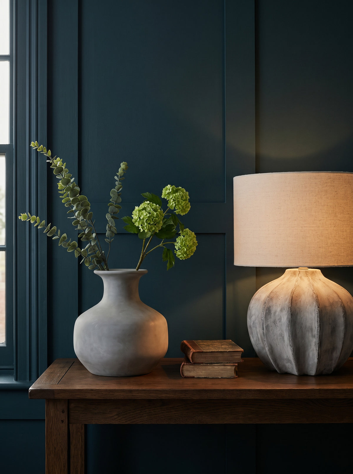 The Darcy Edit — flute lamp, squat stone vase, eucalyptus and green viburnum