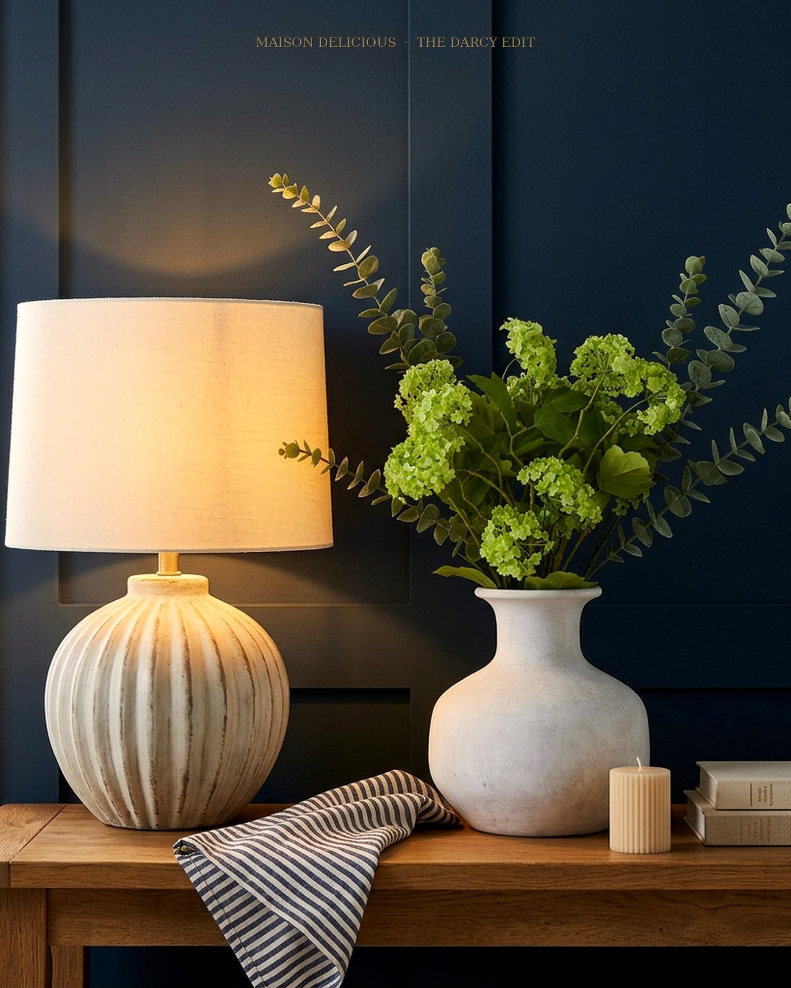The Darcy Edit — styled lifestyle on navy console