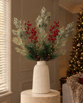 The artificial Frosted Pine & Gold Christmas Bouquet in the white ribbed Monte Large Bell Vase (With vase option) on a stone plinth in a panelled living room