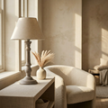 Pella Table Lamp — lifestyle scene in a warm linen room