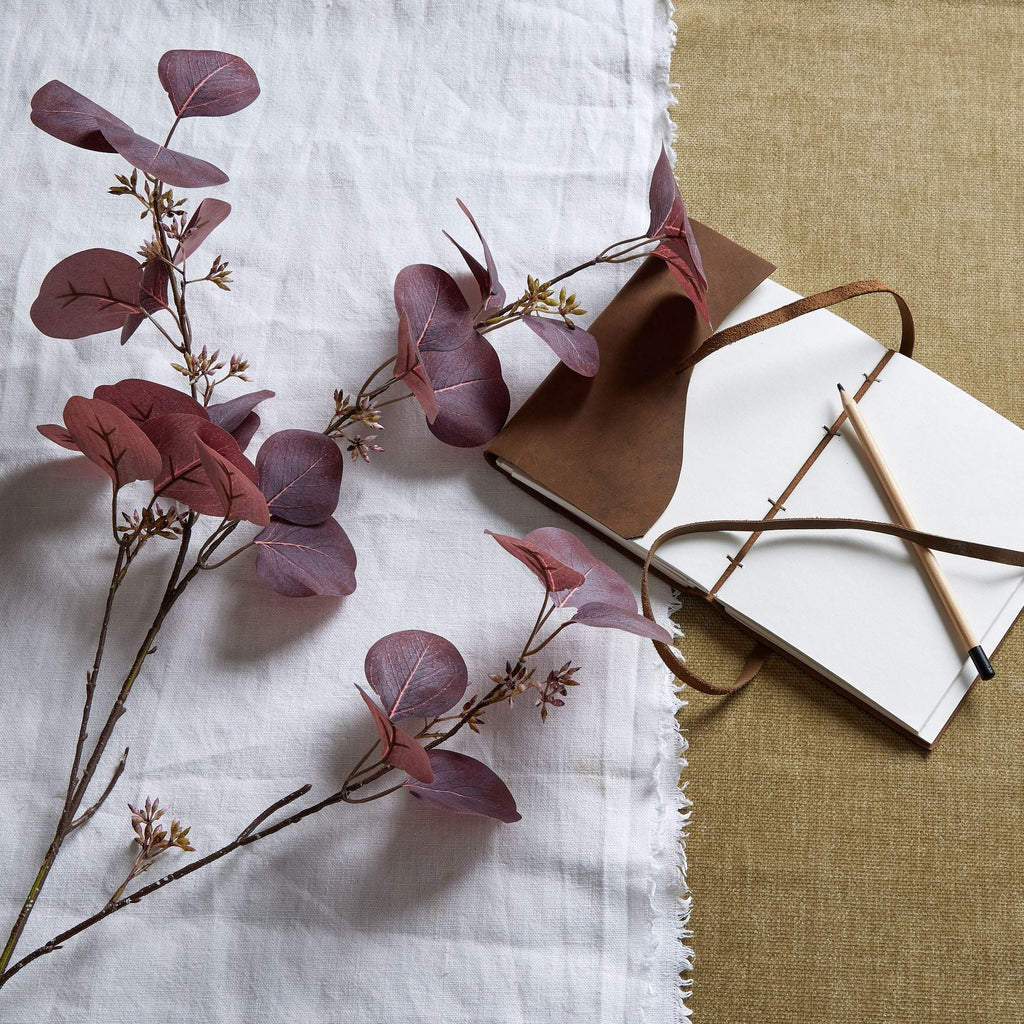 Burgundy Berried Eucalyptus stems included in The Seville Burgundy Bouquet